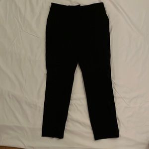Black, 2 short express work pants. Perfect condition. Has stretch to them.